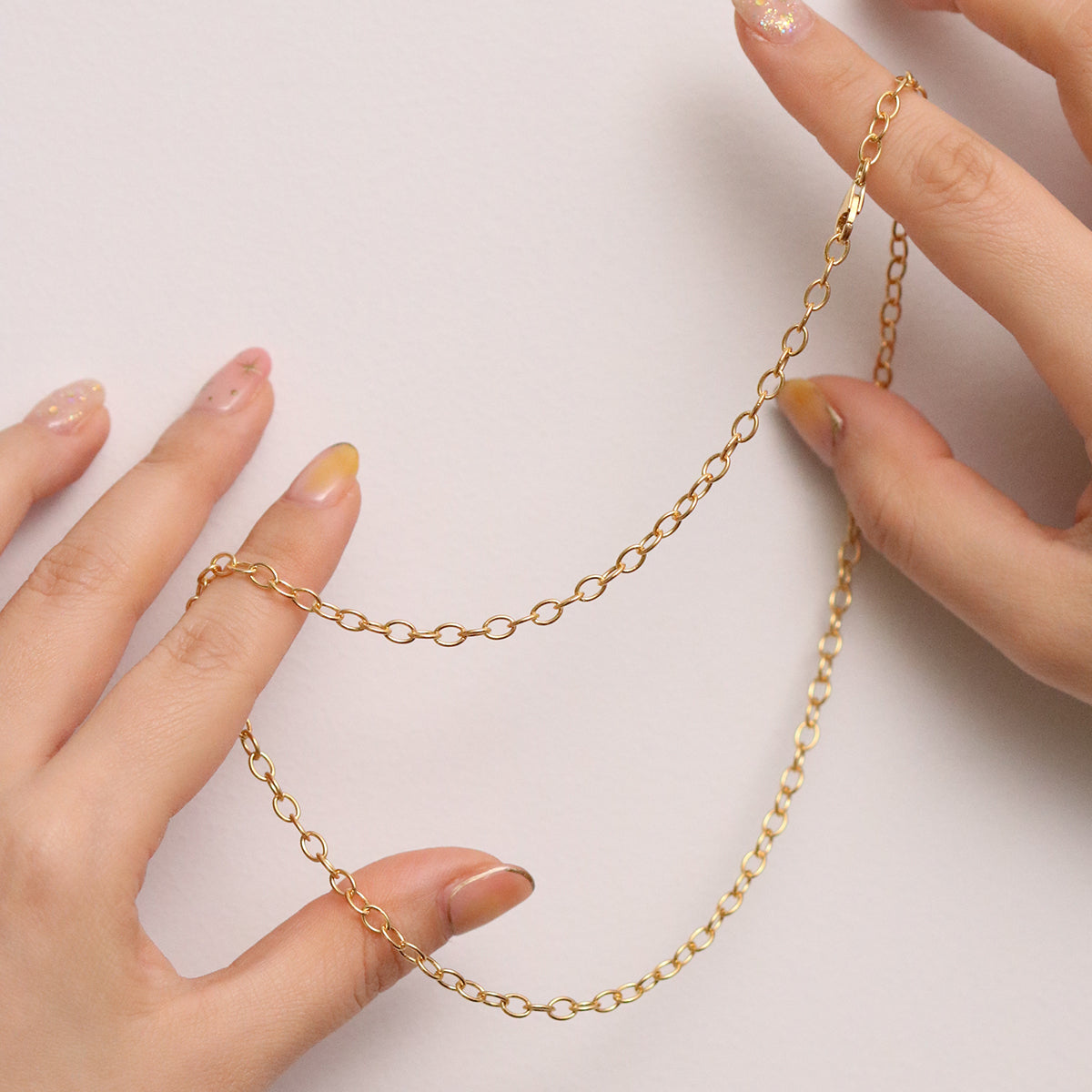 Stylish medium oval chain necklace with smooth, elongated oval links, offering a balanced and elegant design with a polished finish.