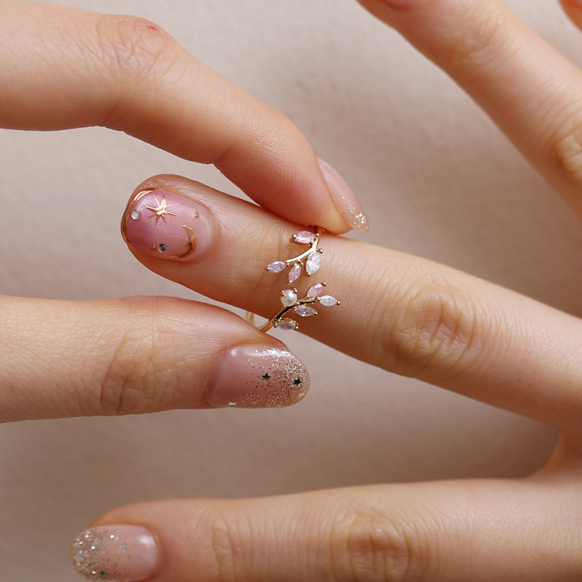 Elegant pearl vine ring with delicate vine design and lustrous pearl for a timeless, feminine look