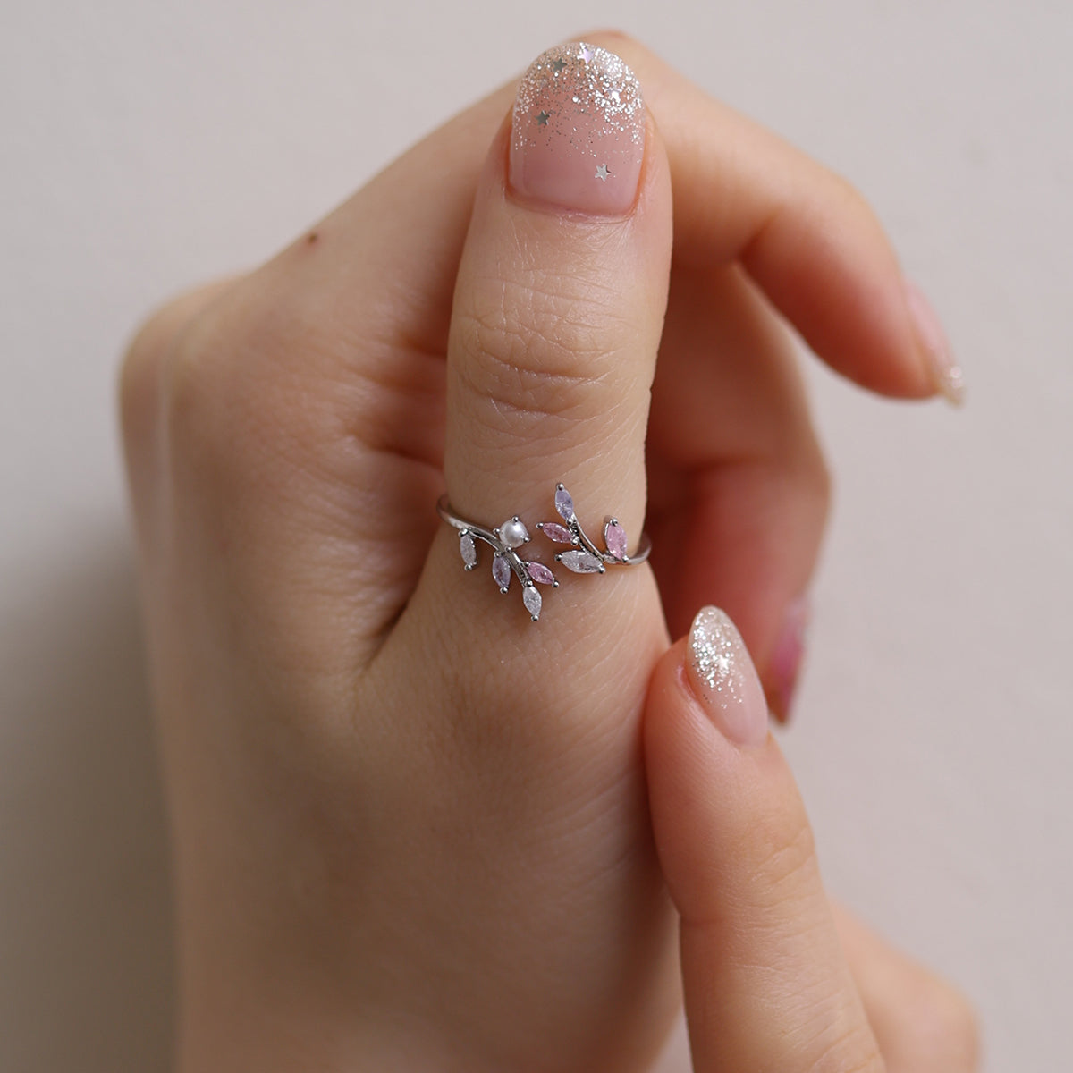 Elegant pearl vine ring with delicate vine design and lustrous pearl for a timeless, feminine look