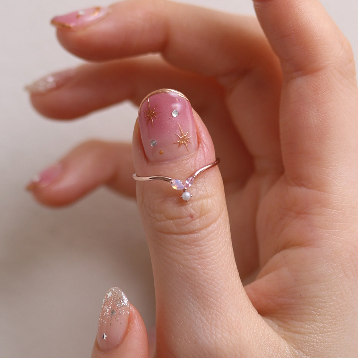 Pearl Pink Gemstone Ring featuring a beautiful pink gemstone, expertly crafted with high-quality materials for a timeless and elegant look.