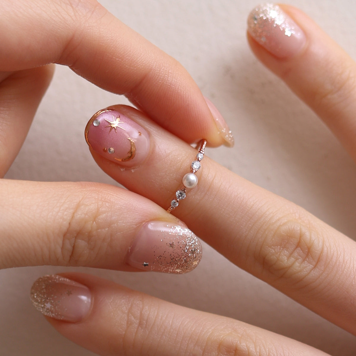 Pearl Cubic Ring featuring high-quality freshwater pearls in a unique cubic design, offering timeless elegance and sophisticated style for any occasion.