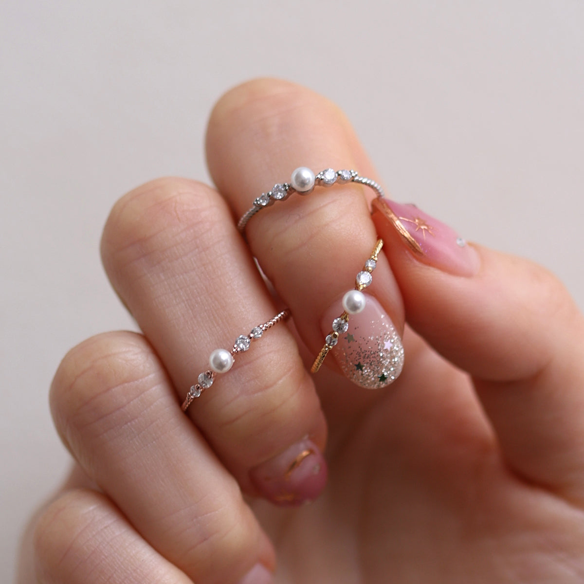 Pearl Cubic Ring featuring high-quality freshwater pearls in a unique cubic design, offering timeless elegance and sophisticated style for any occasion.