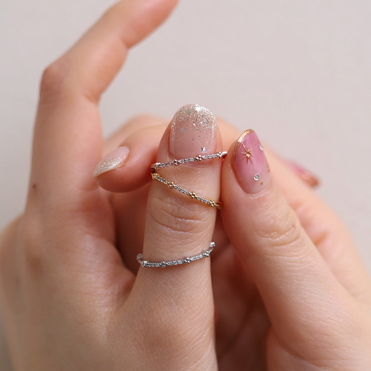 Simple Line Cubic Ring featuring a minimalist band with a single cubic zirconia, offering a sleek and elegant touch to any outfit.