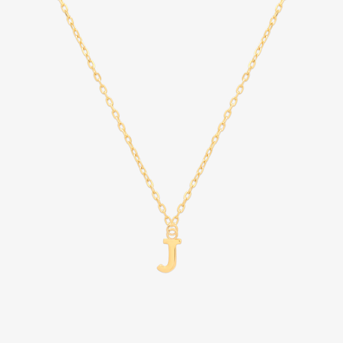Classic initial pendant necklace featuring a polished letter charm on a delicate chain, showcasing a timeless and elegant design.