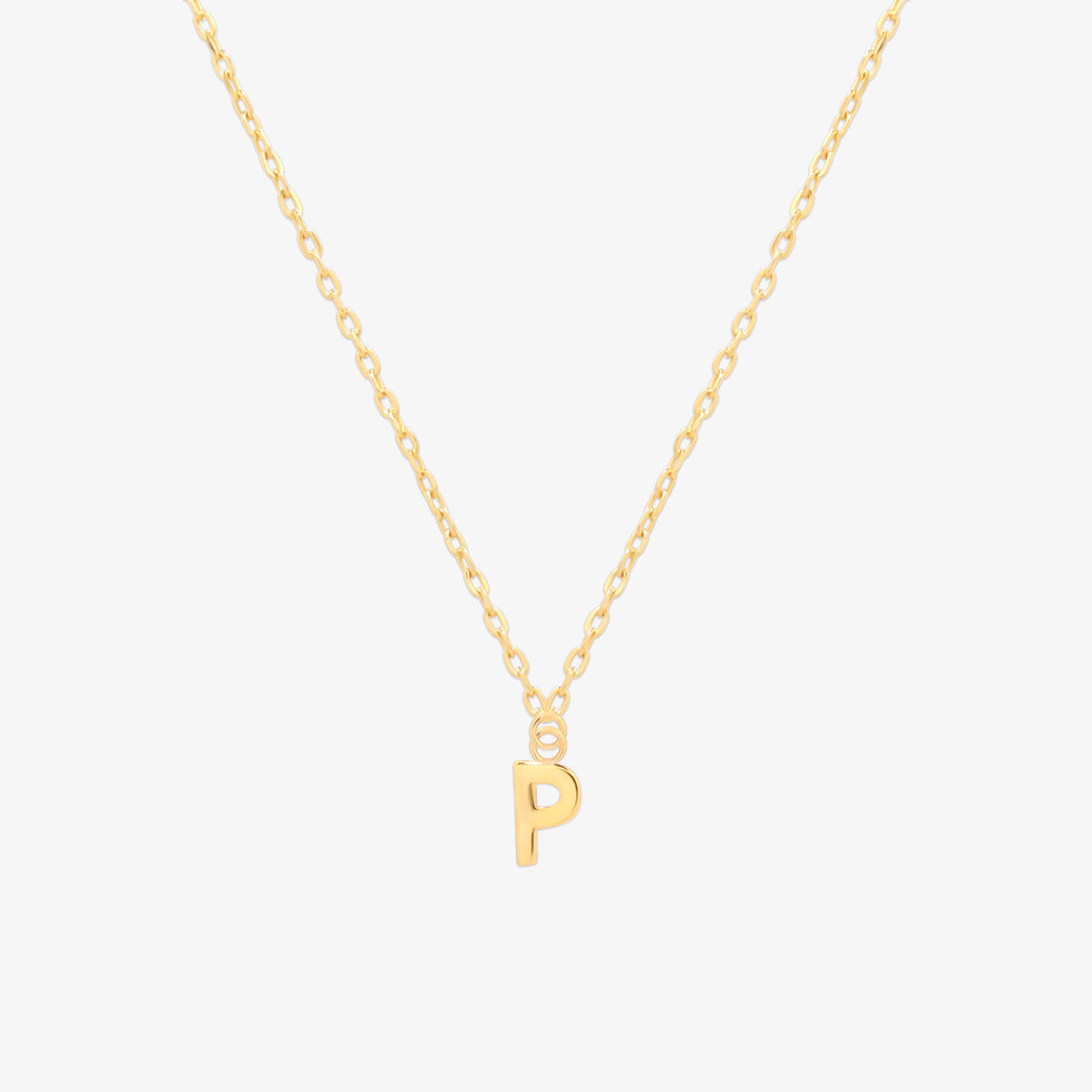 Classic initial pendant necklace featuring a polished letter charm on a delicate chain, showcasing a timeless and elegant design.