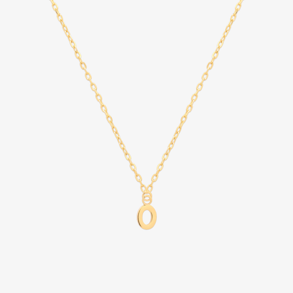 Classic initial pendant necklace featuring a polished letter charm on a delicate chain, showcasing a timeless and elegant design.