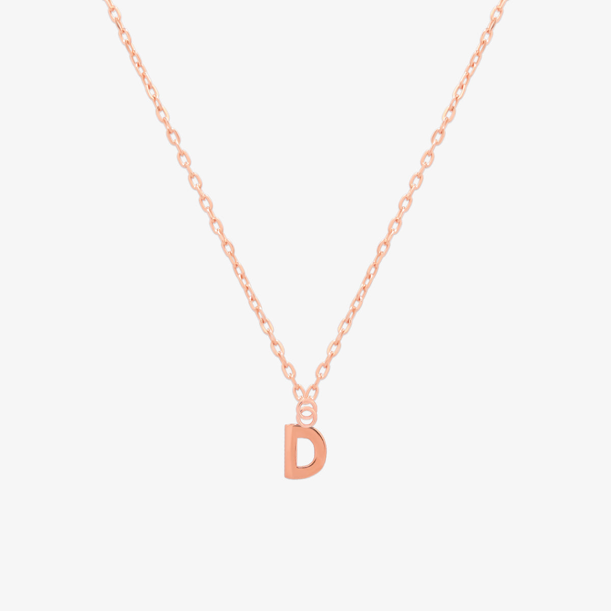 Classic initial pendant necklace featuring a polished letter charm on a delicate chain, showcasing a timeless and elegant design.