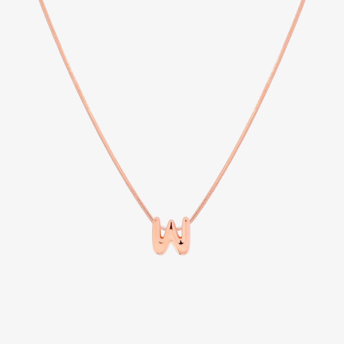 Bubble initial pendant necklace featuring a rounded, playful letter charm on a sleek snake chain, with a smooth and glossy finish.