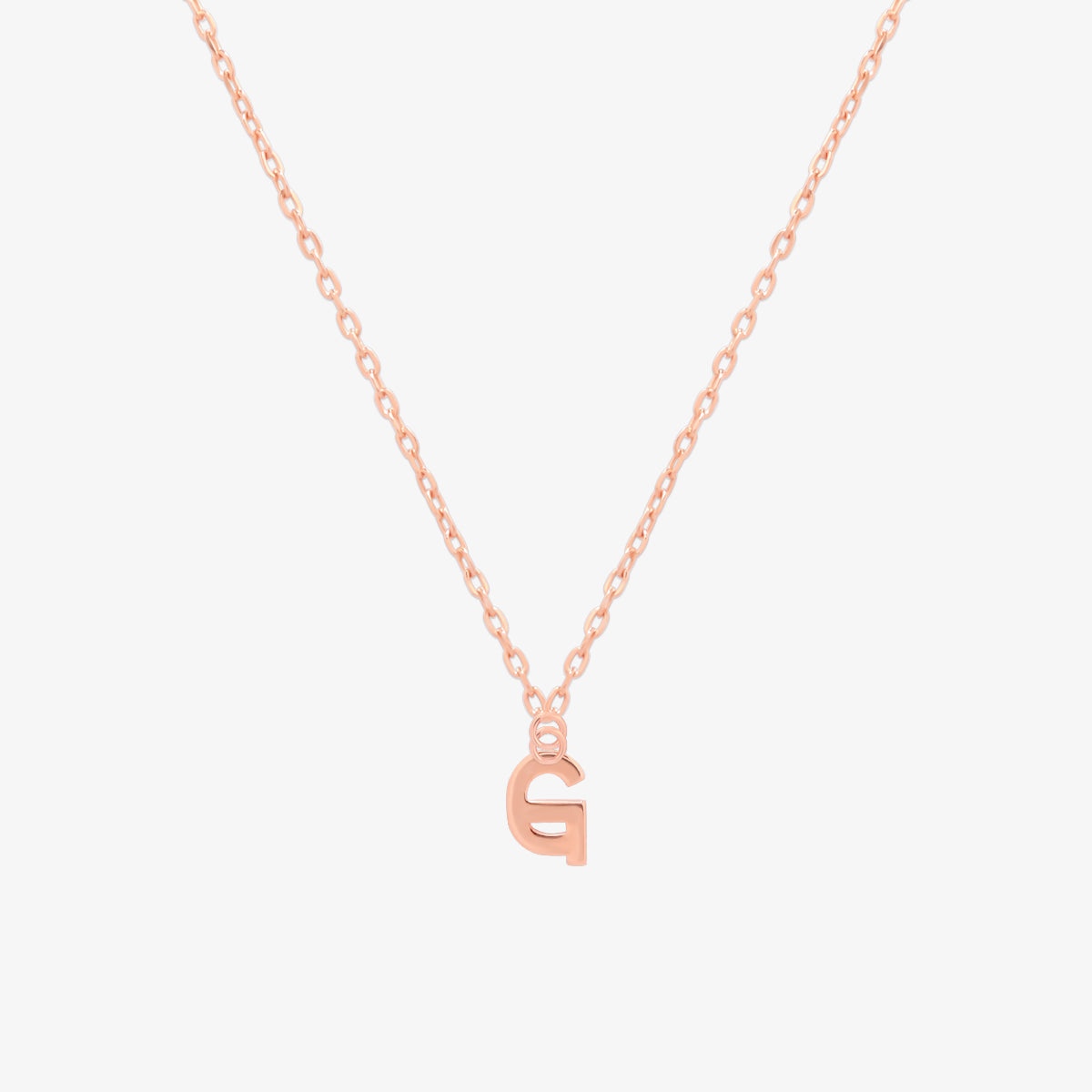 Classic initial pendant necklace featuring a polished letter charm on a delicate chain, showcasing a timeless and elegant design.