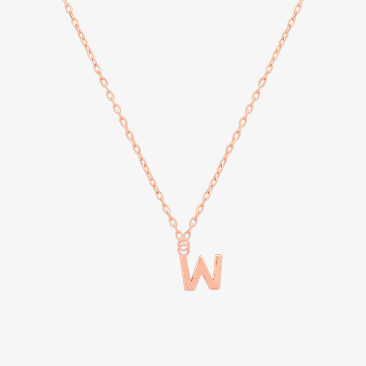 Classic initial pendant necklace featuring a polished letter charm on a delicate chain, showcasing a timeless and elegant design.