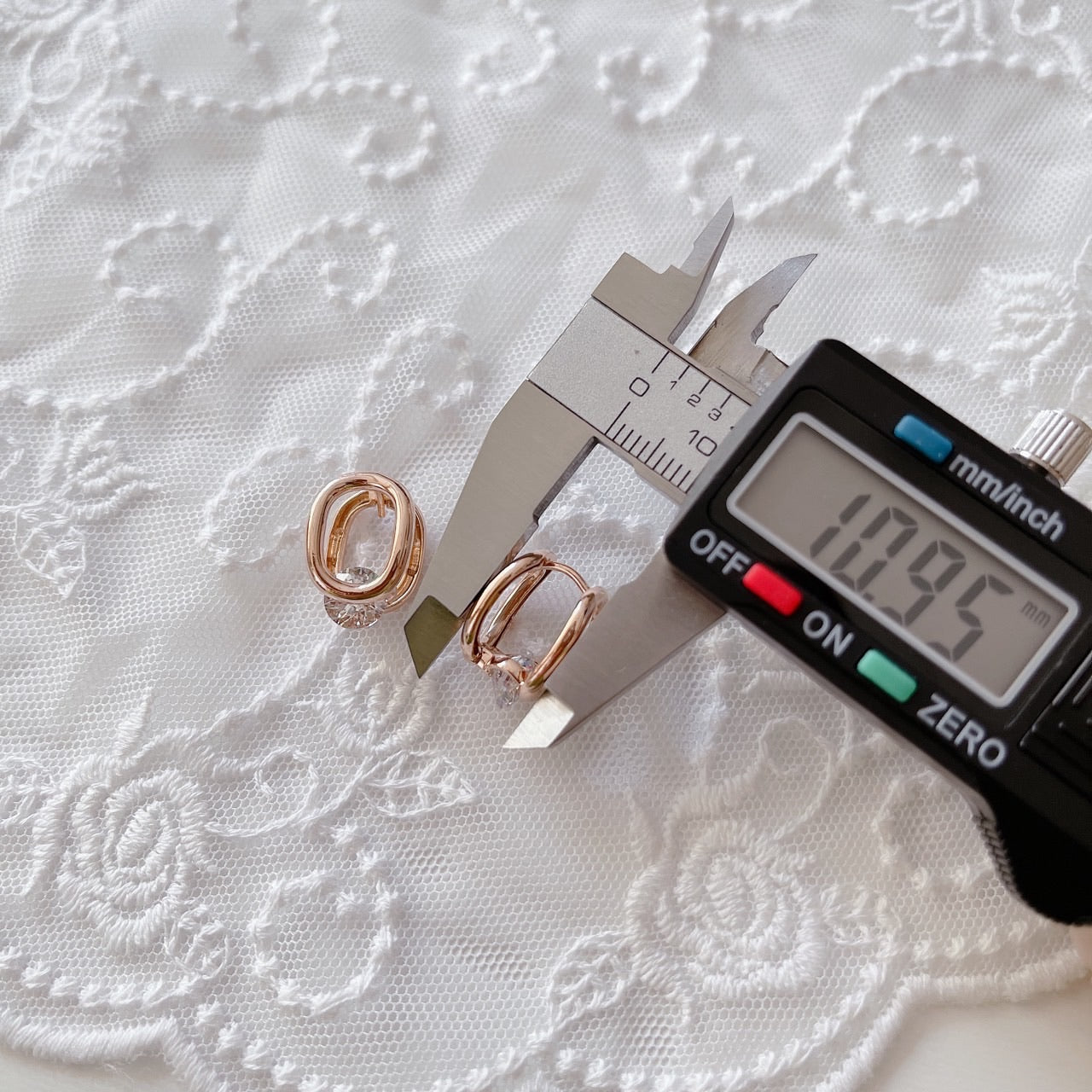 Cubic oval huggie earrings