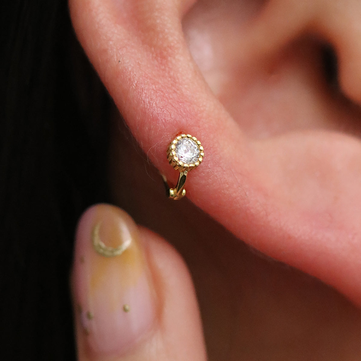 Single cubic huggie earring