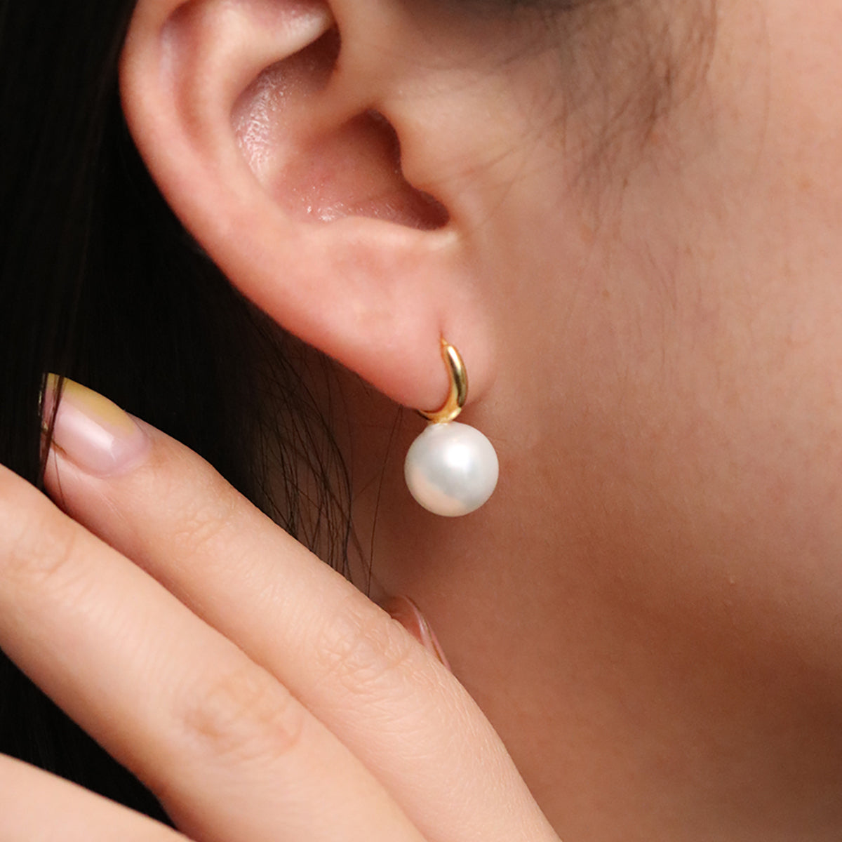 Pearl drop huggie earrings