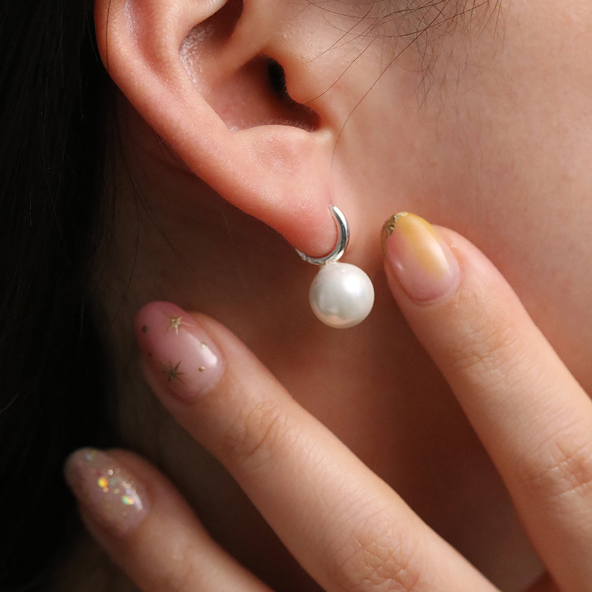 Pearl drop huggie earrings