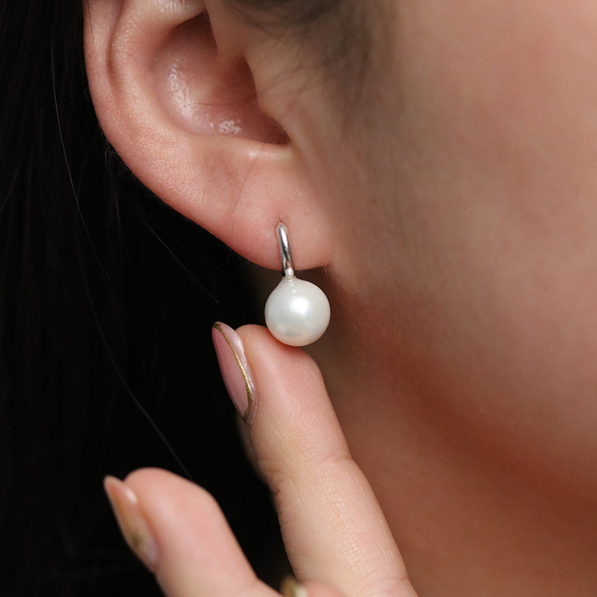 Pearl drop huggie earrings