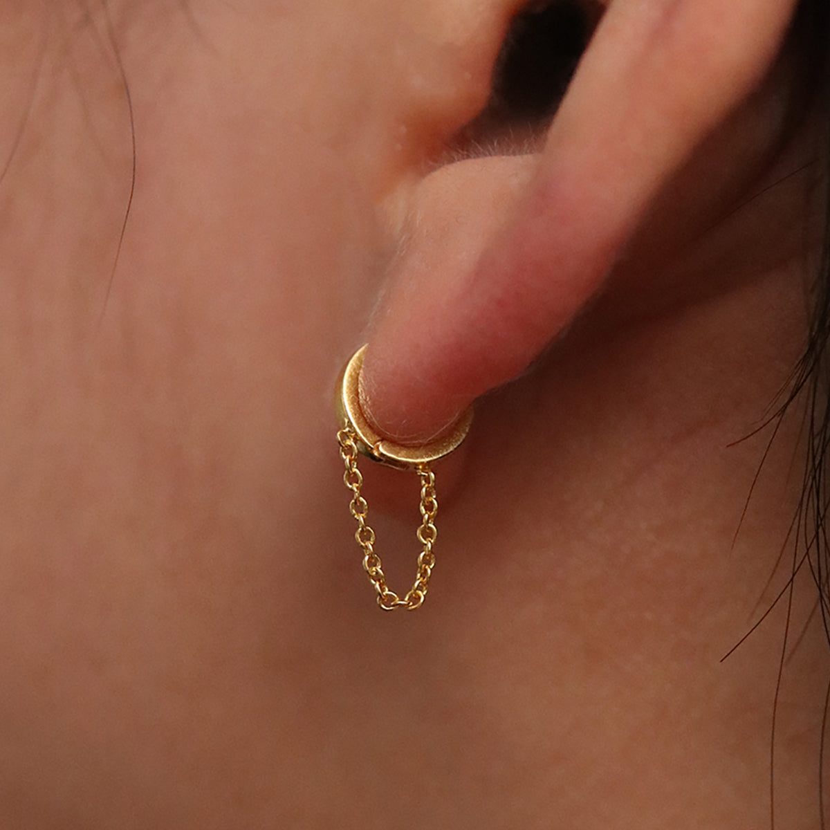 Chain drop huggie earring