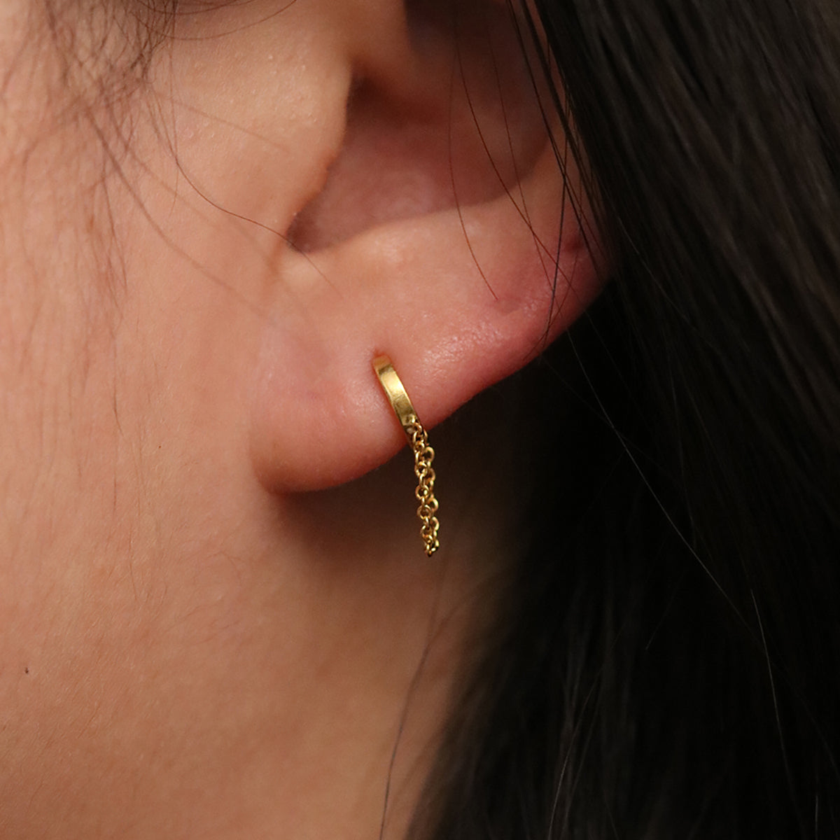 Chain drop huggie earring