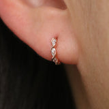 White topaz twirl huggie earrings