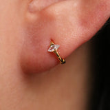 Encased cubic huggie earring