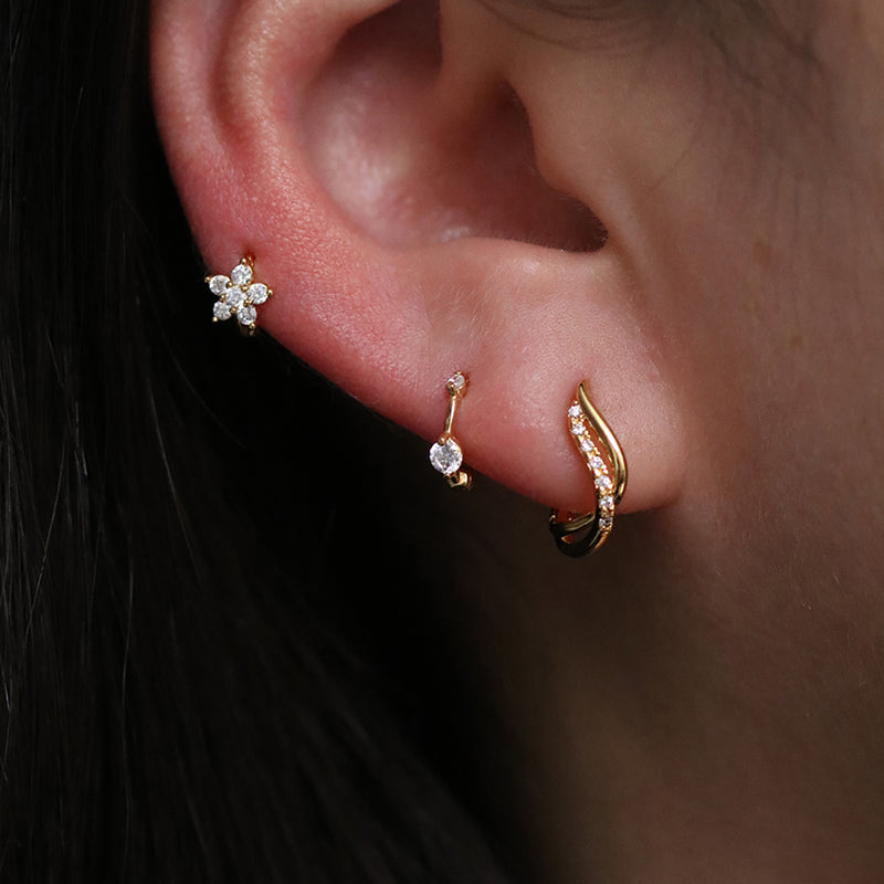 Sleek curved huggie earrings