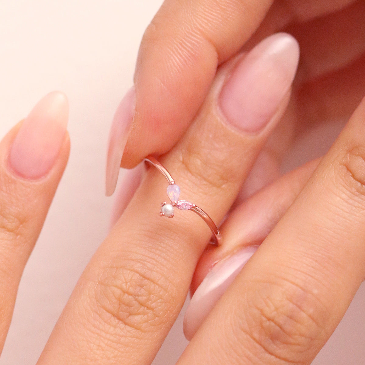 Pearl Pink Gemstone Ring featuring a beautiful pink gemstone, expertly crafted with high-quality materials for a timeless and elegant look.