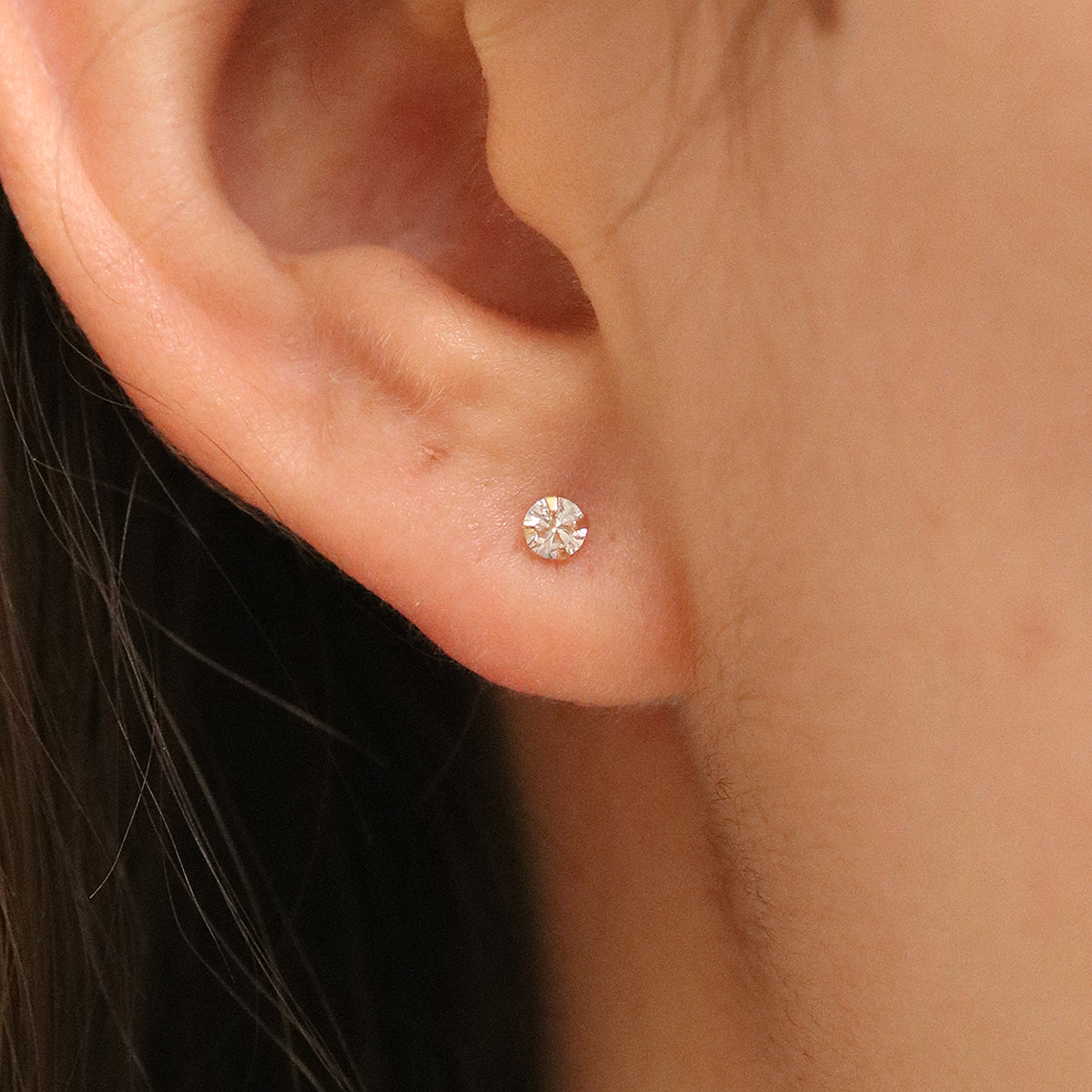 Four prong White Topaz studs