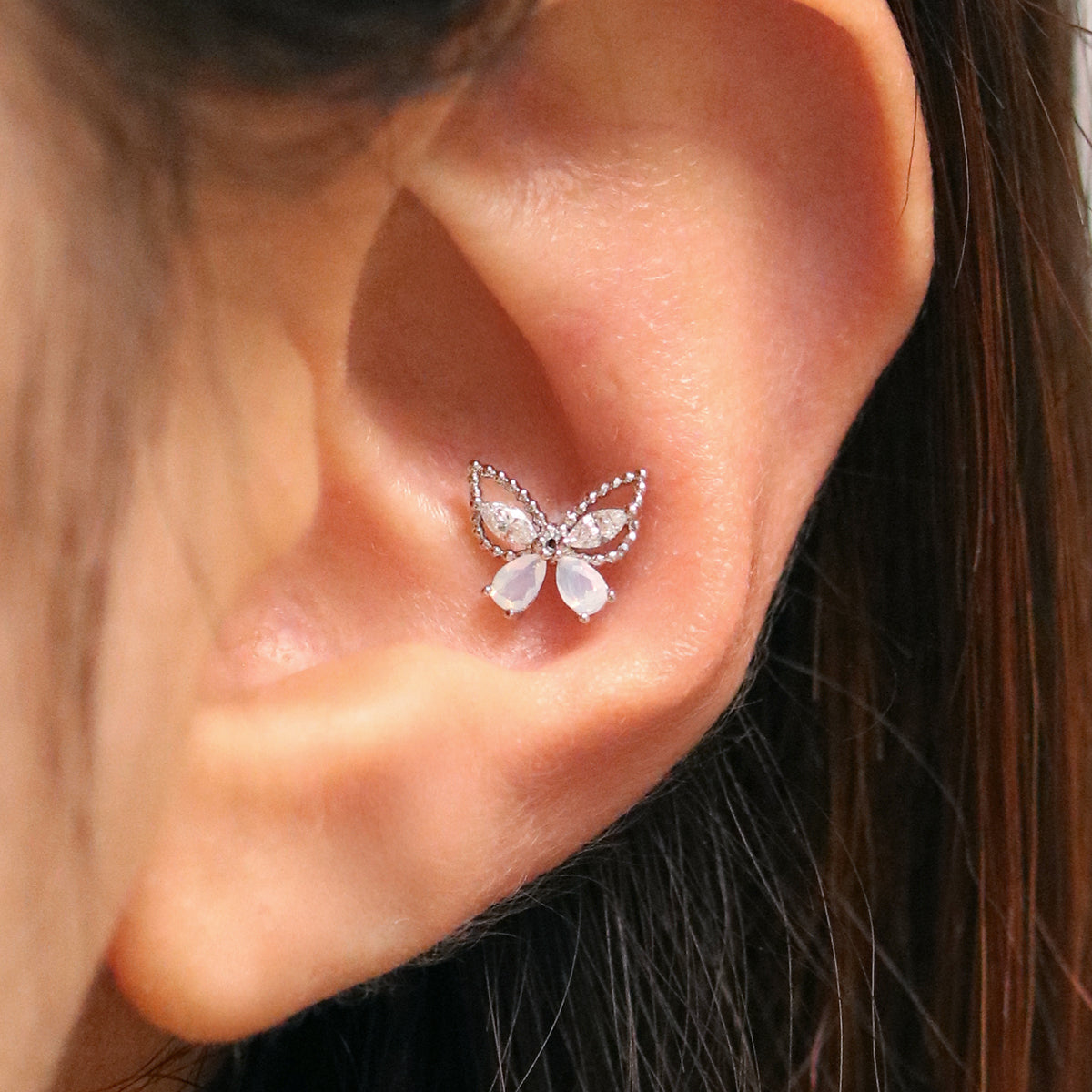 Moonstone butterfly piercing