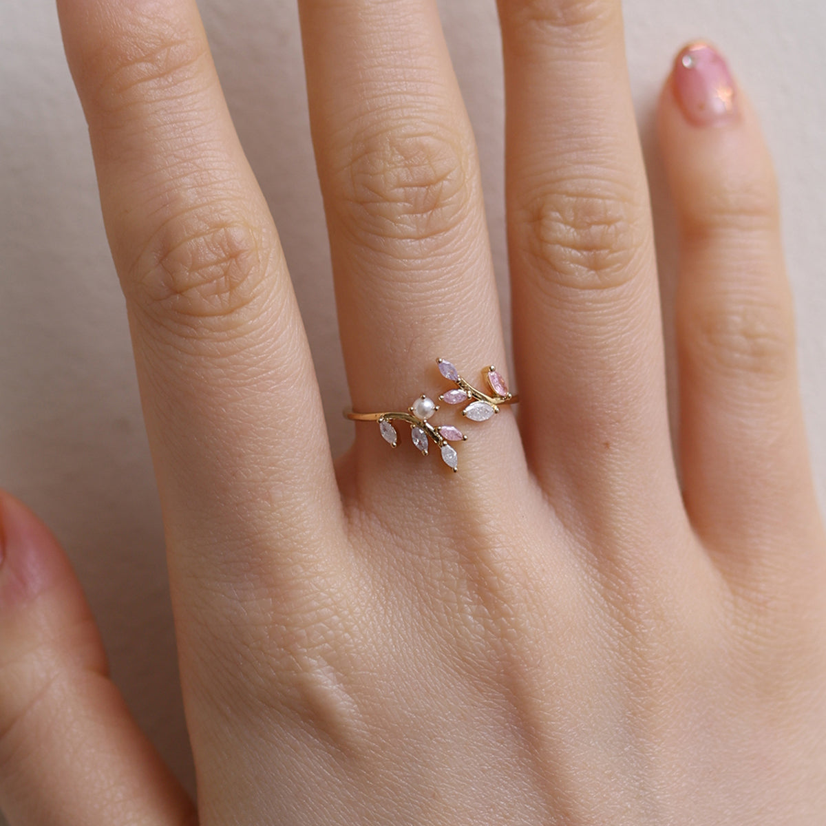 Elegant pearl vine ring with delicate vine design and lustrous pearl for a timeless, feminine look