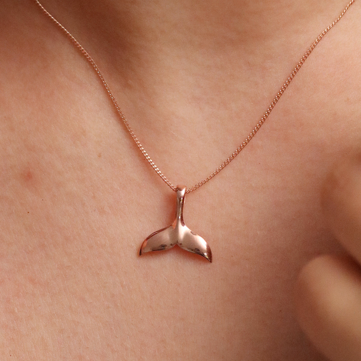 Dolphin tail necklace