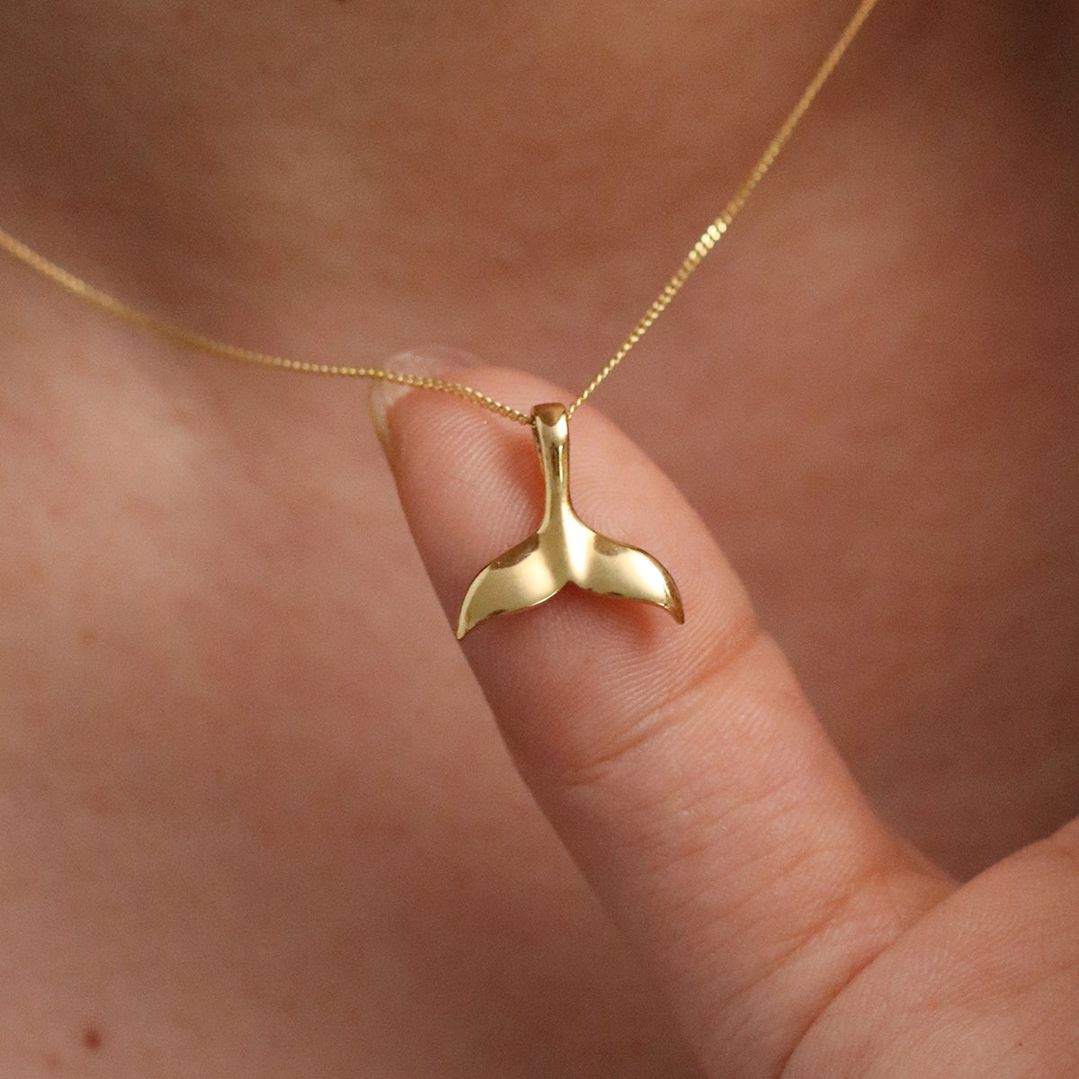 Dolphin tail necklace