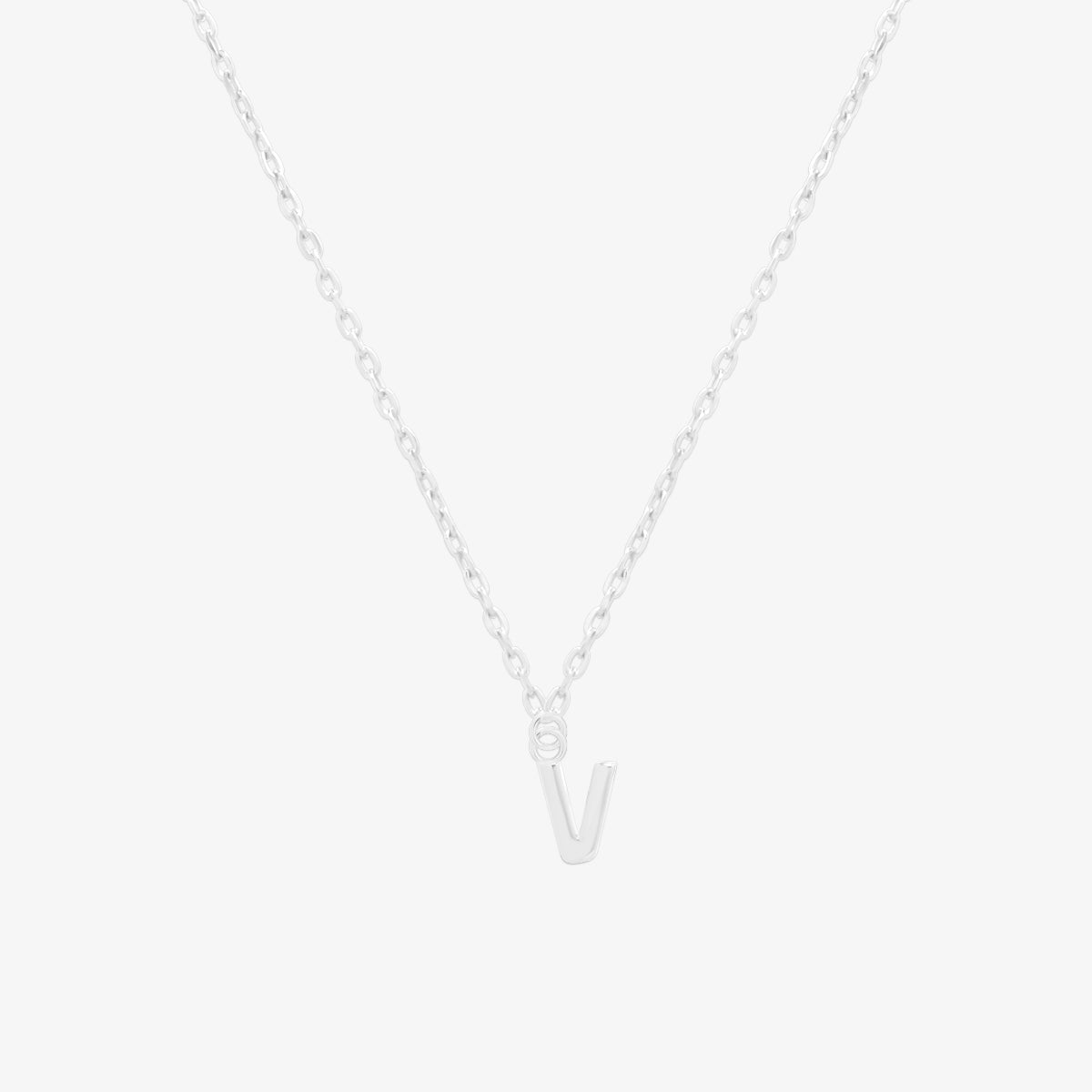 Classic initial pendant necklace featuring a polished letter charm on a delicate chain, showcasing a timeless and elegant design.
