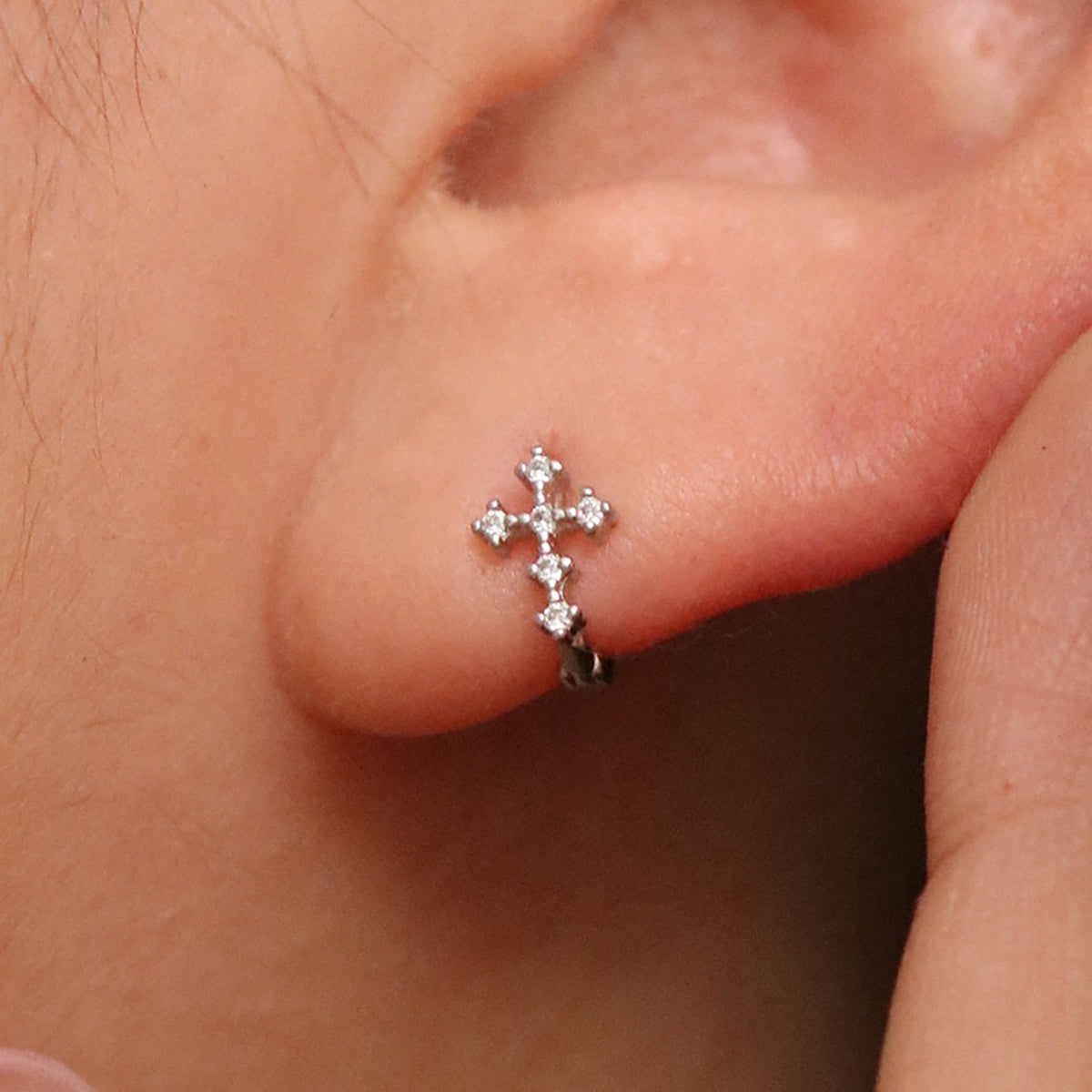 Cubic cross huggie earring