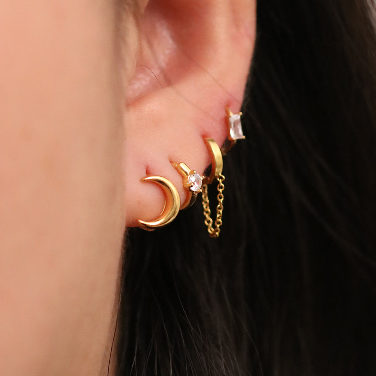 Crescent huggie earrings