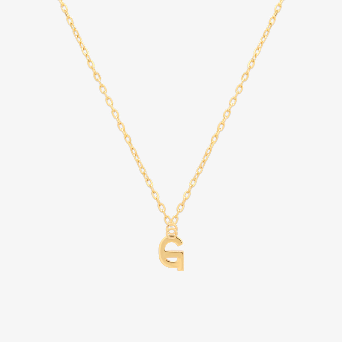 Classic initial pendant necklace featuring a polished letter charm on a delicate chain, showcasing a timeless and elegant design.