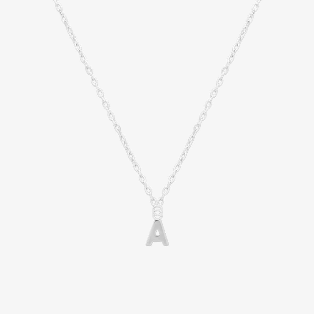 Classic initial pendant necklace featuring a polished letter charm on a delicate chain, showcasing a timeless and elegant design.