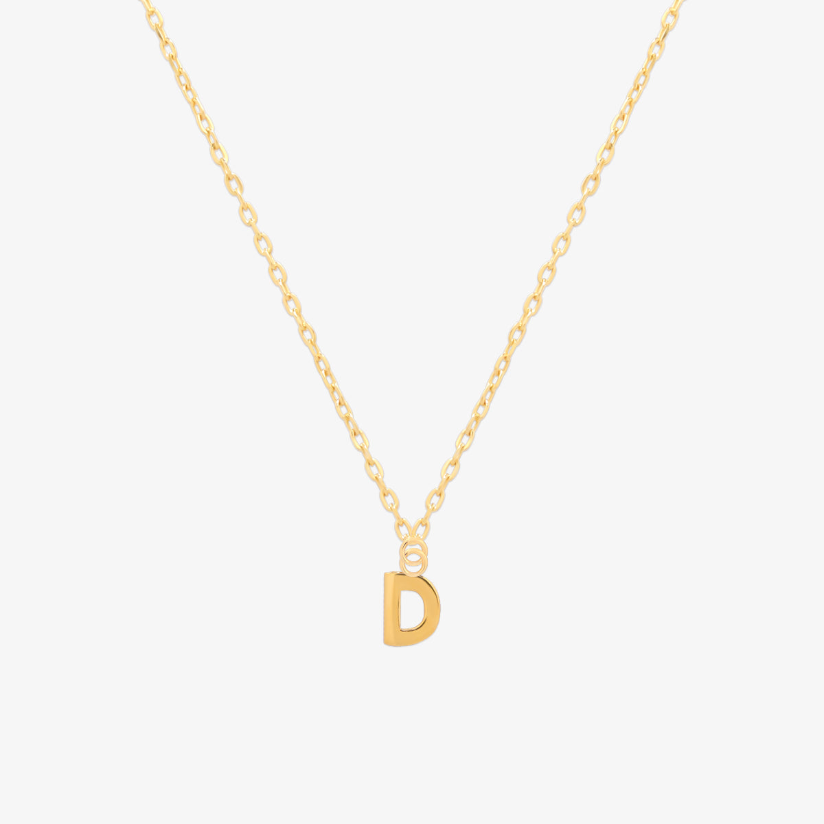 Classic initial pendant necklace featuring a polished letter charm on a delicate chain, showcasing a timeless and elegant design.