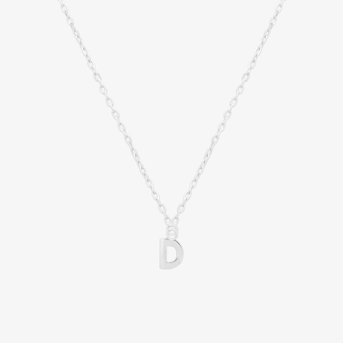 Classic initial pendant necklace featuring a polished letter charm on a delicate chain, showcasing a timeless and elegant design.