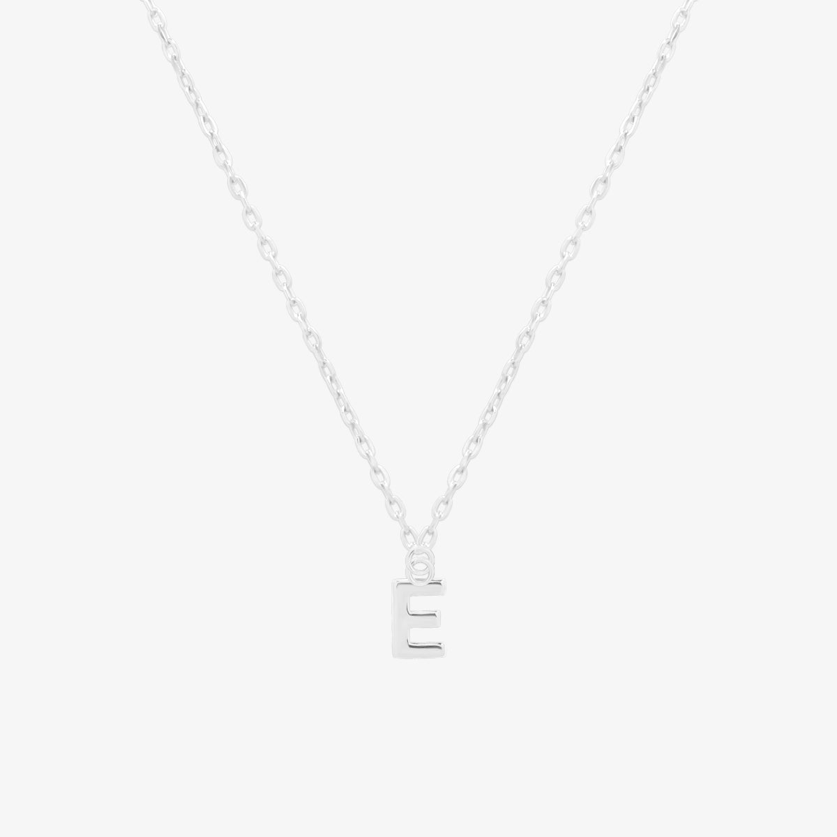 Classic initial pendant necklace featuring a polished letter charm on a delicate chain, showcasing a timeless and elegant design.