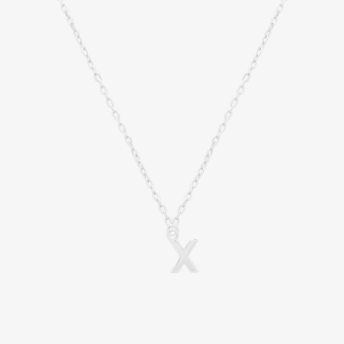 Classic initial pendant necklace featuring a polished letter charm on a delicate chain, showcasing a timeless and elegant design.