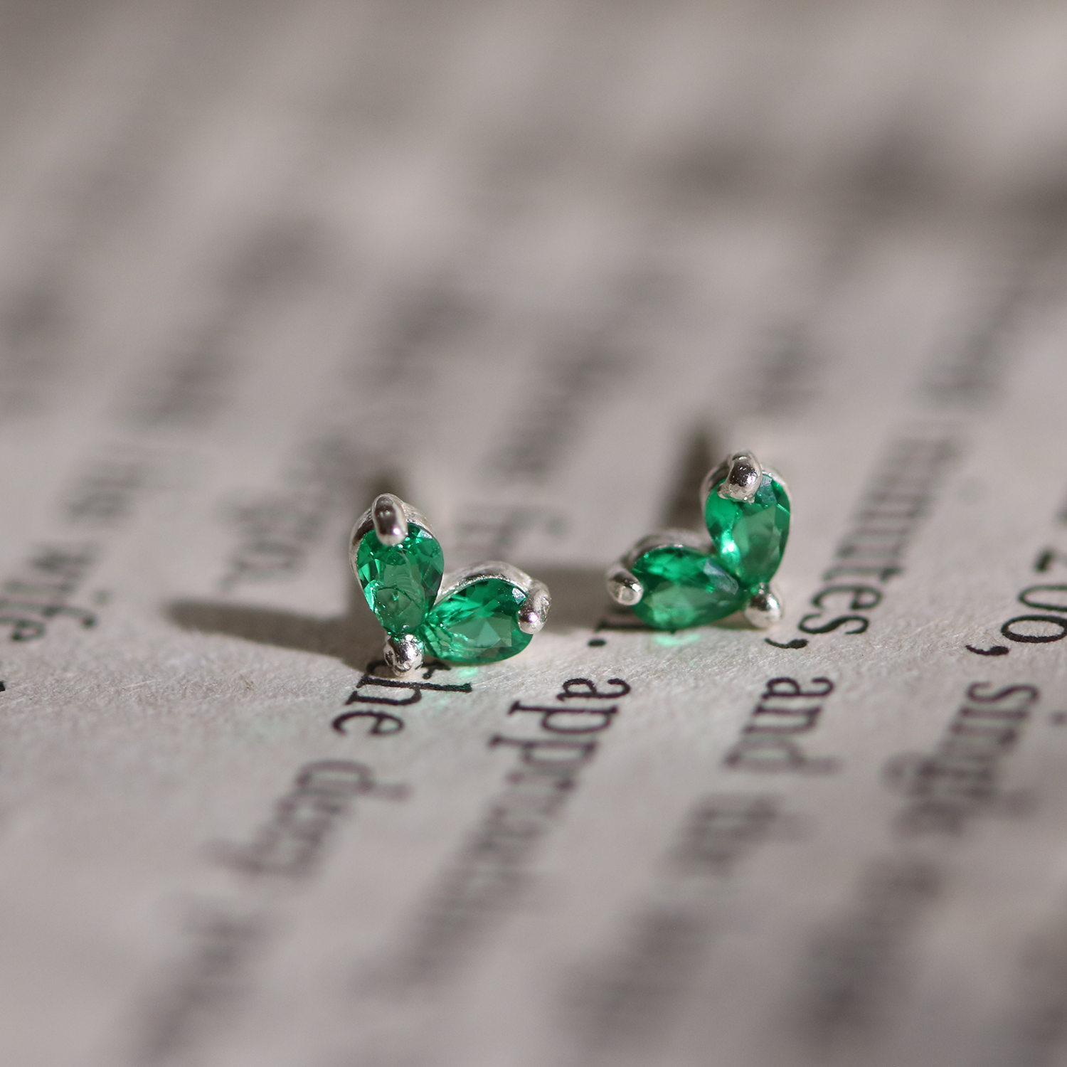 Tiny green leaf stud earrings