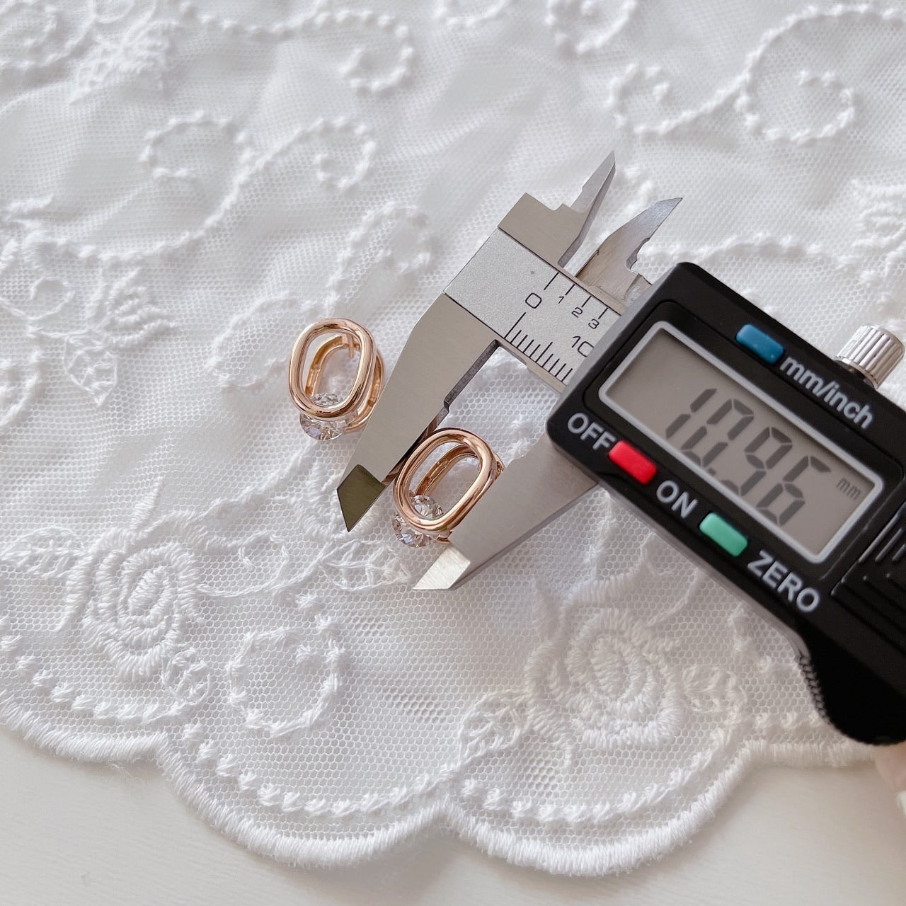 Cubic oval huggie earrings